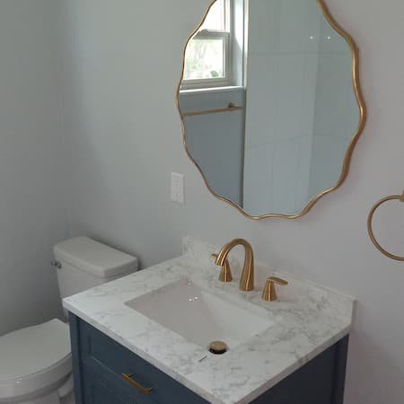 White bathroom vanity with mirror